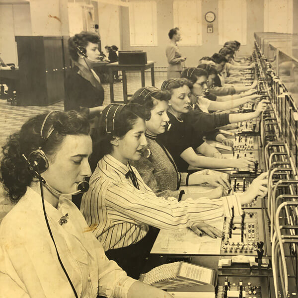 a historical photo of women switchboard operators